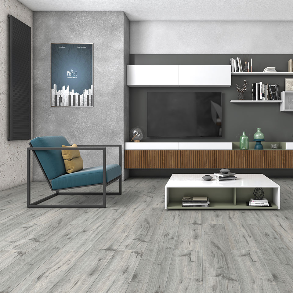 Lamiante flooring in grey in wooden style in clean spacious apartment