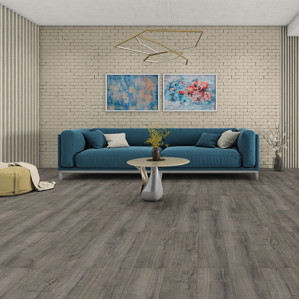 Laminate wooden flooring in modern living room with large sofa