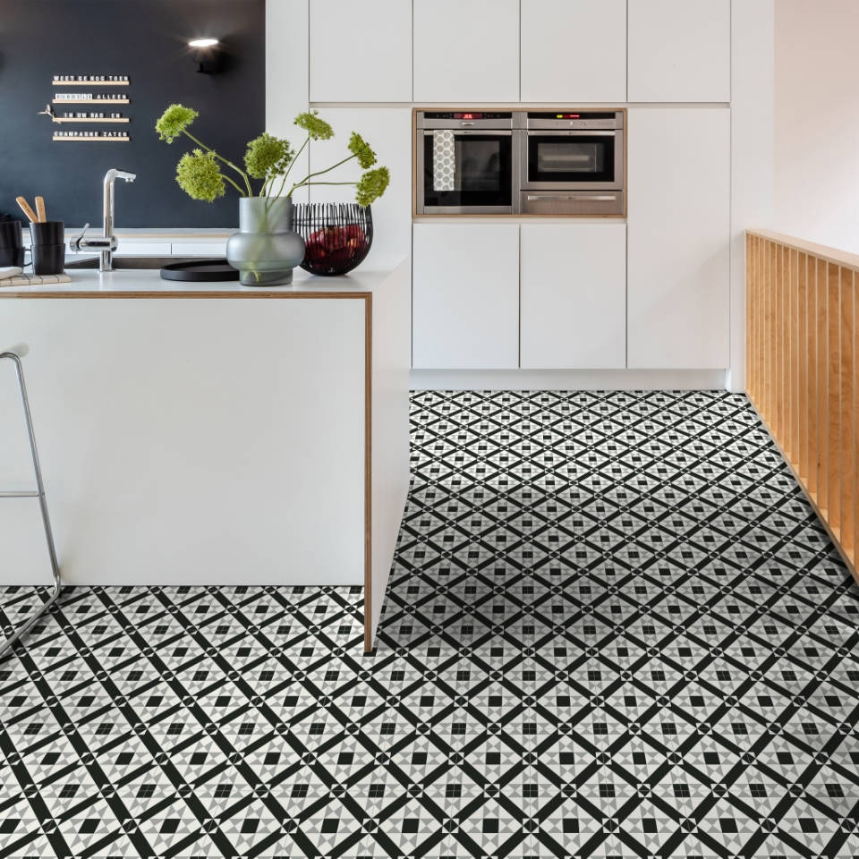 Black and white tile effect vinyl featured in a kitchen