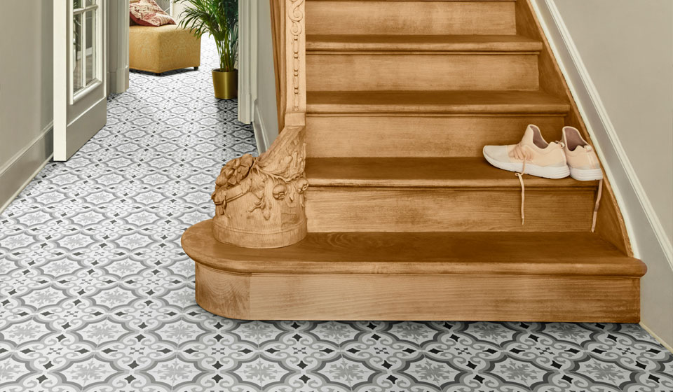 Vinyl flooring in a spaceious hallway with wooden staircase