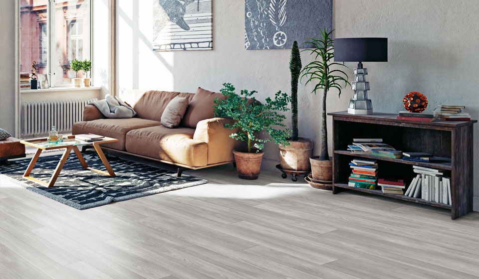 Wood effect vinyl flooring in an open, spavious living room