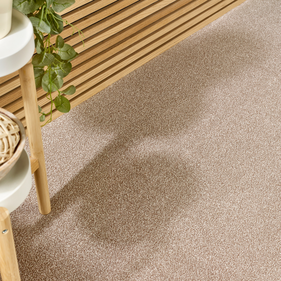 Caerphilly saxony carpet with a sidetable on the carpet