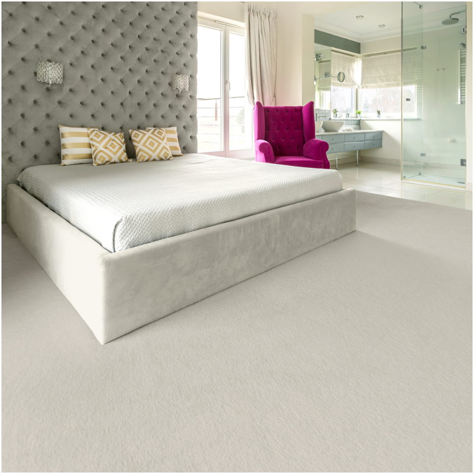 Desire saxony carpet in colour Coriander in a bedroom
